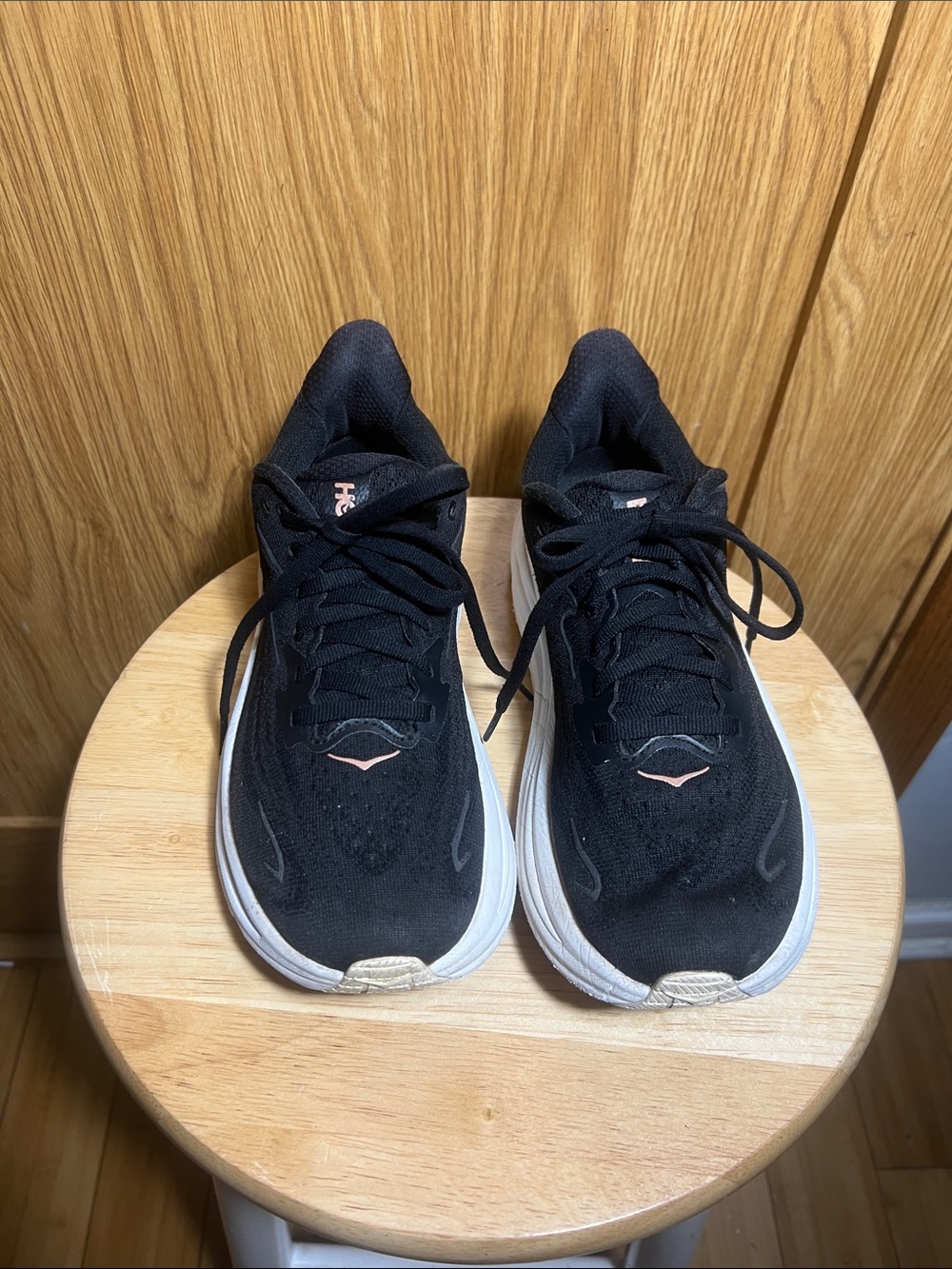 Hoka Black and White Women’s Athletic Running Shoes with Pink Accents